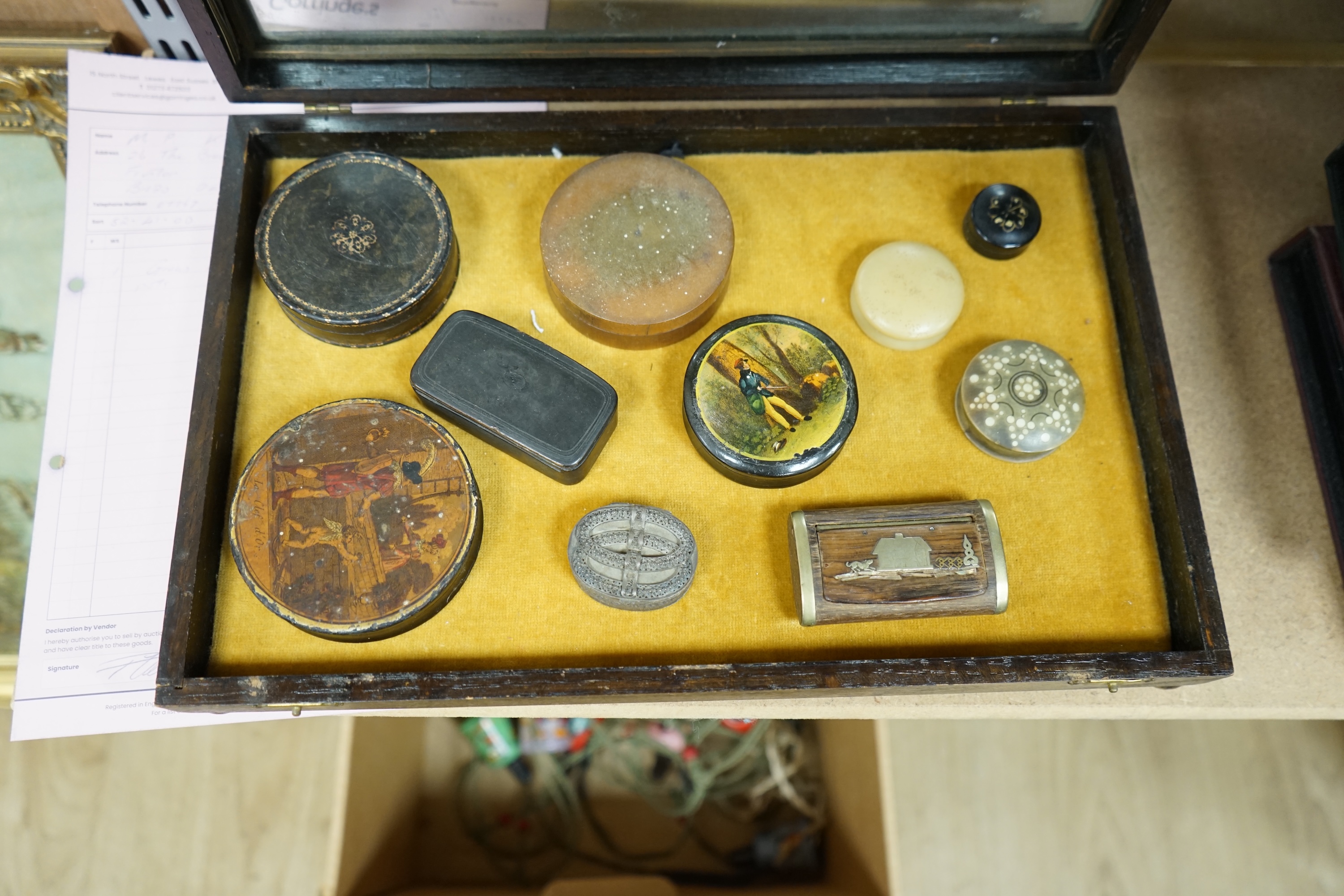 Ten various snuff boxes to include horn, white metal, brass mounted and one printed with a classical scene, 19th/20th century, largest 9cm in diameter. Condition - fair